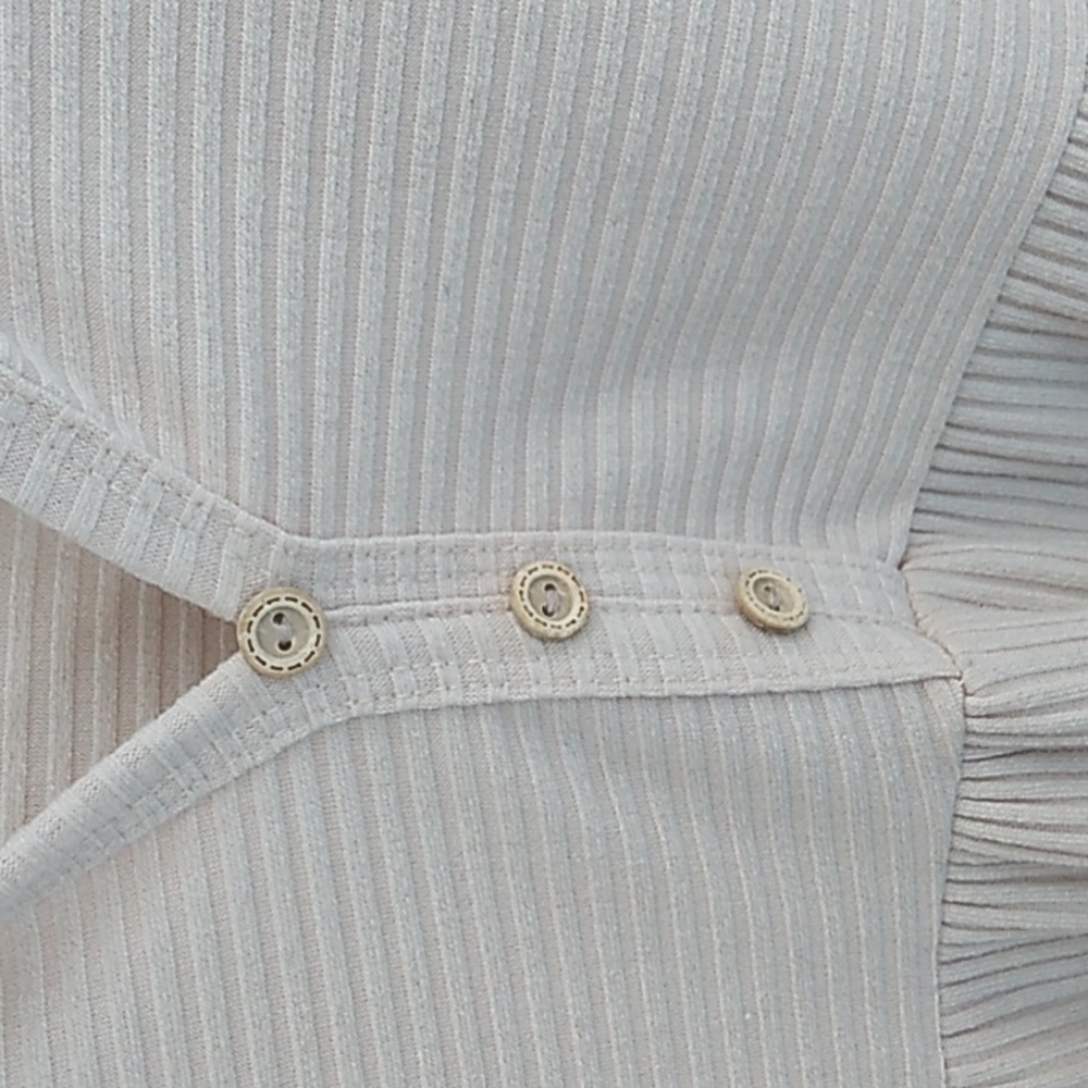 Meduim long sleeved shirt cream colored